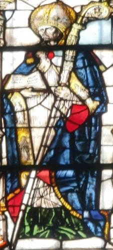 Detail of A Stained Glass Window of Saint Jucudus of Aosta In Episcopal Dress Holding A Silver Crozier And An Open Missal 1493 By Pietro Vaser Cathredral of Santa Maria Assunta Aostal Italy Photographed In February 2010 By Laurom